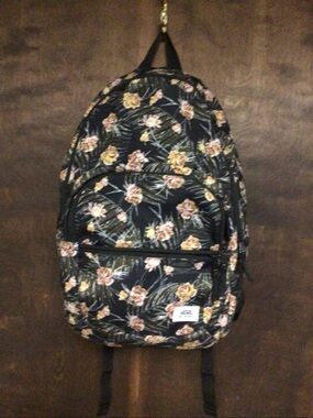 Vans Backpack with flower design. Back to school special. Barely used condition.